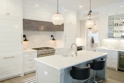 Kitchen with stone surfaces for countertops.