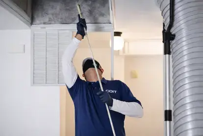 COIT Technician cleaning Air Ducts