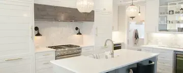 Kitchen with stone surfaces for countertops.