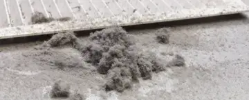 Dust from air duct next to air intake grate 