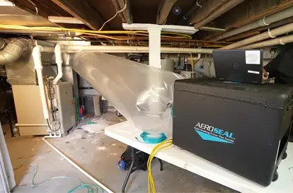 Aeroseal being applied to air duct system