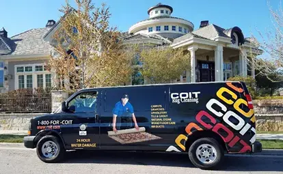 COIT cleaning service van displaying carpet, rug, upholstery, tile and air duct cleaning services