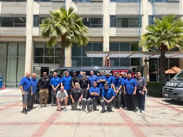 Group photo of COIT team in front of the UCLA building
